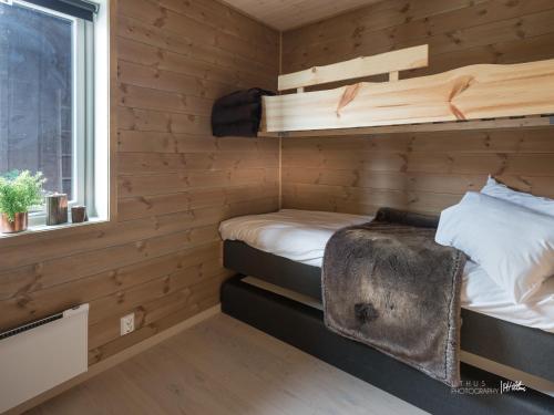 Tempat tidur susun dalam kamar di Myrkdalen Resort Klypeteigen Apt