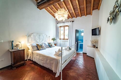 Кровать или кровати в номере Oltrarno Apartment