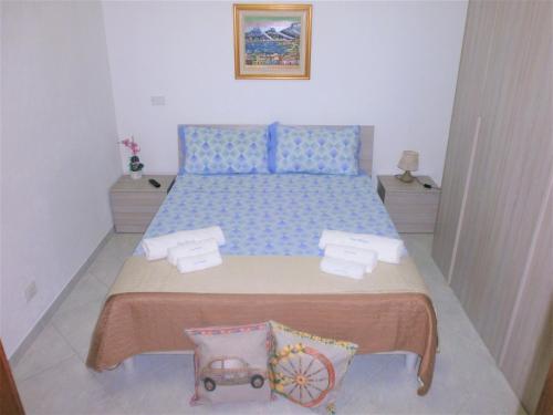 Casa Vacanze Triscele tesisinde bir odada yatak veya yataklar