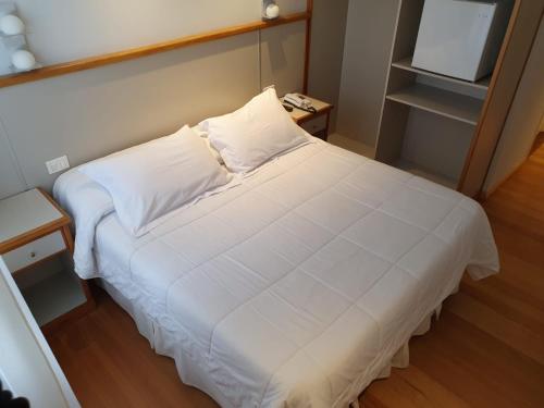 Katil atau katil-katil dalam bilik di Hotel Italiano