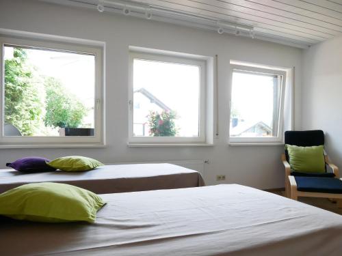 En eller flere senger på et rom på Haus Vita Ferien- und Seminarhaus