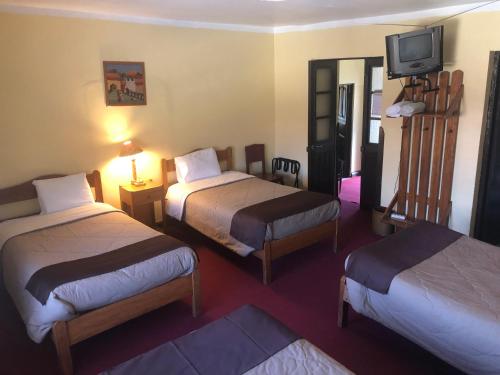 Posteľ alebo postele v izbe v ubytovaní Hospedaje Turistico Recoleta
