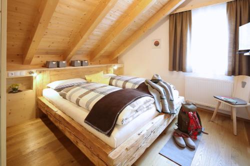 Una cama o camas en una habitación de Faltnerhof