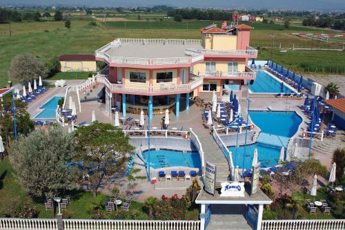 an aerial view of a large house with a swimming pool at Hotel Aperio in Paralia Katerinis