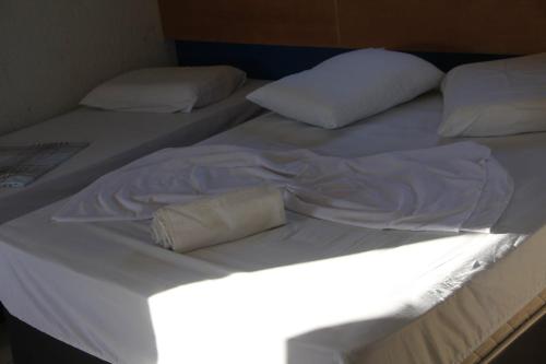 Ένα ή περισσότερα κρεβάτια σε δωμάτιο στο Hotel Pousada Paraiso Avaré