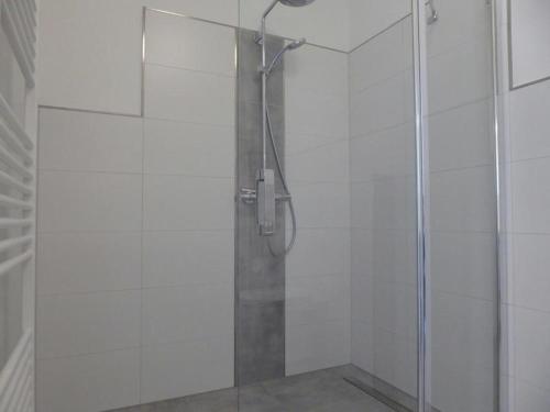 Um banheiro em Apartment HEIMATHAFEN, Am Alten Deich 14/1