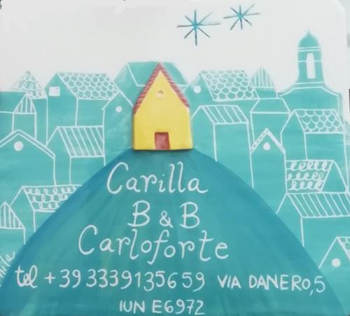 a sign with a cartoon character on it at Carilla B&B in Carloforte