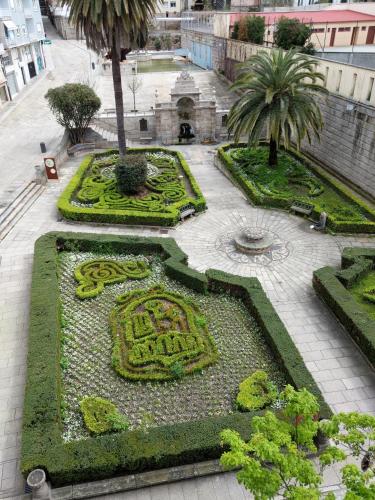 an aerial view of a garden in a city at Burgas Termal in Ourense