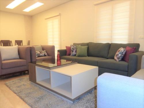 Area soggiorno di Elite Residence - Koura , Near Tripoli