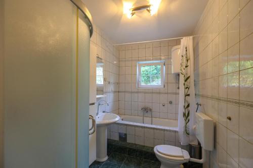 Ванная комната в Apartments Vicko
