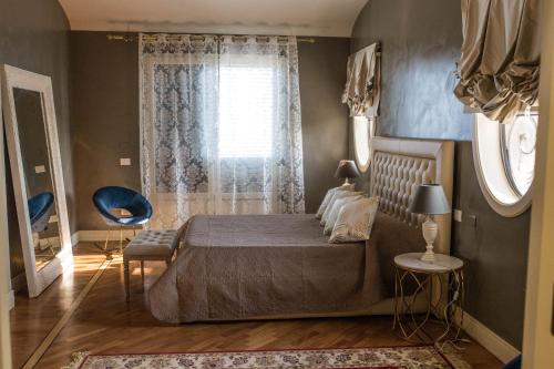 Un pat sau paturi într-o cameră la Villa Corbera Palmaris