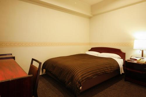 Posteľ alebo postele v izbe v ubytovaní Hotel Sunlife