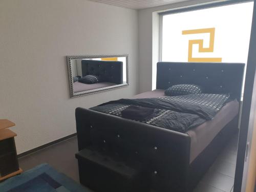 Кровать или кровати в номере 3 Doppel Zimmer Apartement in 9320 Arbon