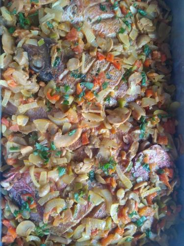 a dish of food with mushrooms and vegetables at Ciza e Rose in Portela