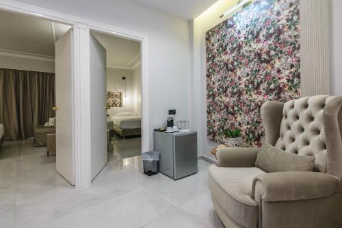 Ένα ή περισσότερα κρεβάτια σε δωμάτιο στο Plaza Pallas