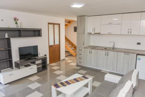 Kuchyň nebo kuchyňský kout v ubytování Leonida Resort
