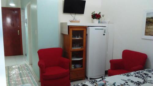 Ein Sitzbereich in der Unterkunft Apartamento Copacabana 8