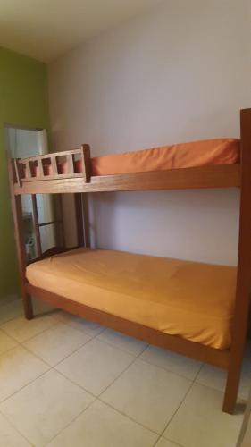 two bunk beds in a room at Piratas do Sol Hostel in Recife