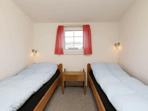 Posteľ alebo postele v izbe v ubytovaní Two-Bedroom Holiday home in Ringkøbing 30