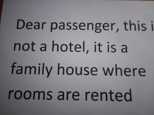 a sign that says dear passenger this is not a hotel at Arroyo de la Miel centro in Benalmádena