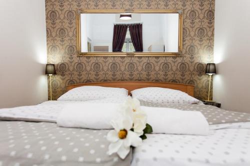 Postel nebo postele na pokoji v ubytování Avenida Park Hotel