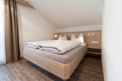 Postel nebo postele na pokoji v ubytování Haus Pipperger