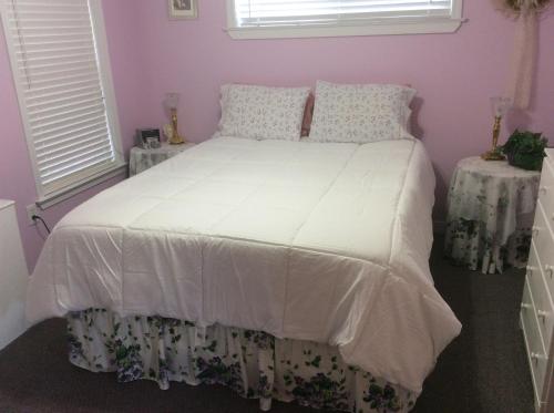 Posteľ alebo postele v izbe v ubytovaní pearl1