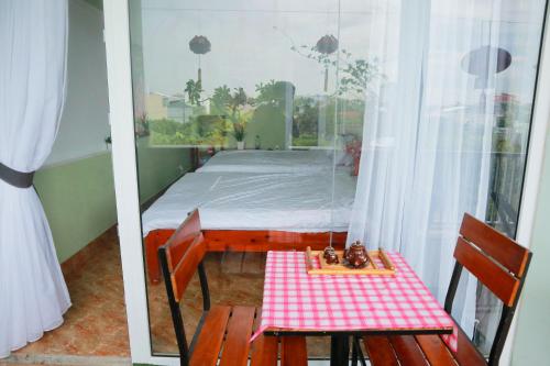 Postel nebo postele na pokoji v ubytování Memory Homestay Hue
