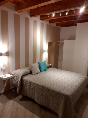 Ένα ή περισσότερα κρεβάτια σε δωμάτιο στο Casa Margò