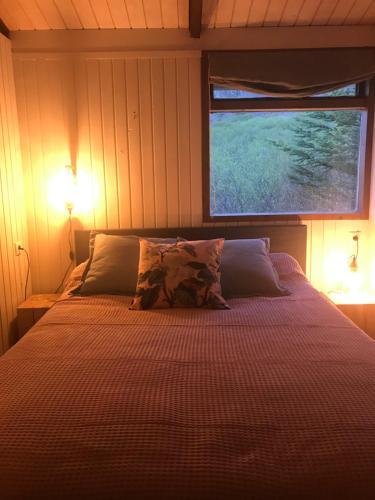 Cama o camas de una habitación en Mulakot Cosy Cabins