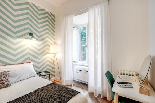 Ένα ή περισσότερα κρεβάτια σε δωμάτιο στο Trastevere 2.0