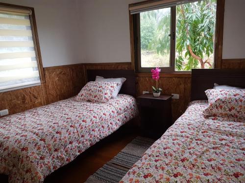 Postel nebo postele na pokoji v ubytování Cabañas PUREVA