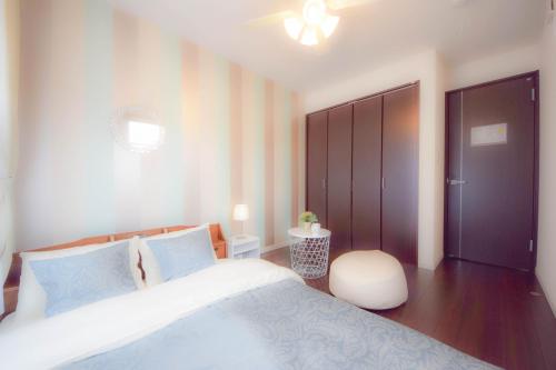 Una cama o camas en una habitación de FINOA Residential Suite Kagurazaka