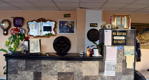 a counter in a store with a counter top at Kent Motel in Chatham