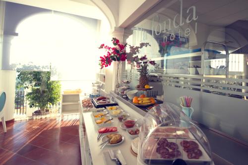 Comida en o cerca de este hotel