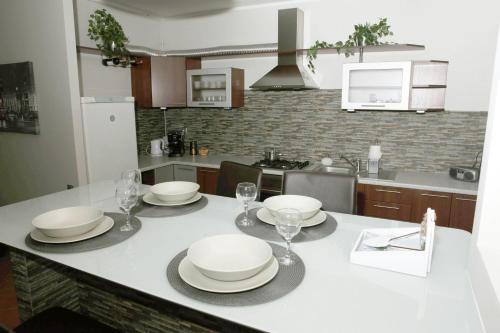 Kuchyň nebo kuchyňský kout v ubytování Apartament-Studio