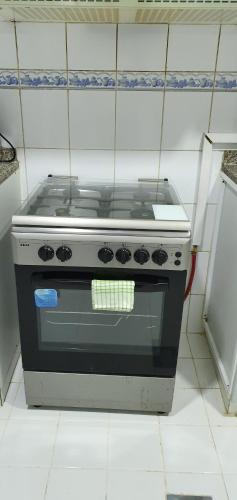 Kuchyň nebo kuchyňský kout v ubytování Ivory Hotel Apartments