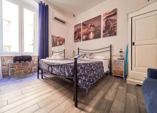 Postel nebo postele na pokoji v ubytování La Gemma delle 5 Terre