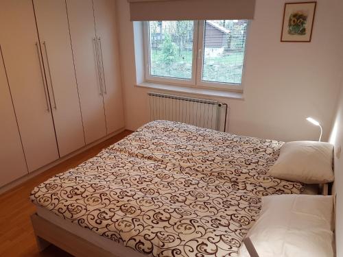Postel nebo postele na pokoji v ubytování Apartment Venko