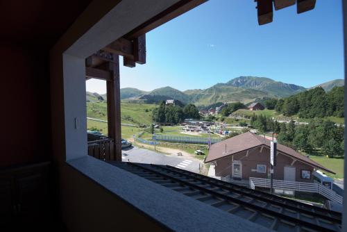 Nespecifikovaný výhled na hory nebo výhled na hory při pohledu z apartmánu