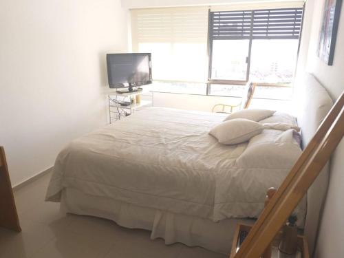 Postel nebo postele na pokoji v ubytování Parquemar Center 2, Torre D, Apartamento 1302