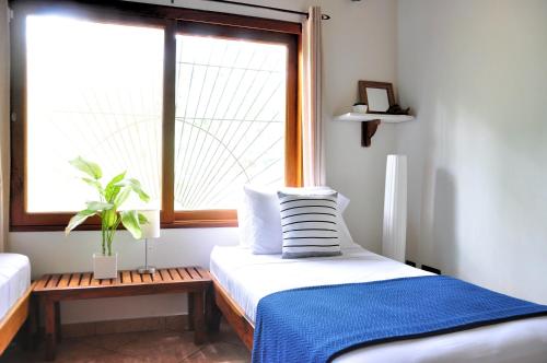 Katil atau katil-katil dalam bilik di Pazifico Villas