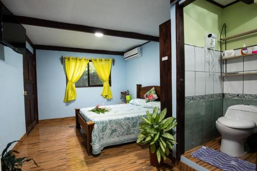 Giường trong phòng chung tại Hotel Sunshine Caribe