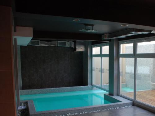 a swimming pool in the middle of a building at URBANA APARTMENTS 413 in San Carlos de Bariloche