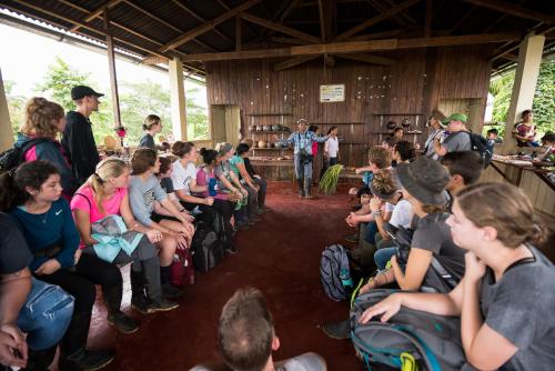 a group of people sitting in chairs in a room at Pacaya Samiria Amazon Lodge - ALL INCLUSIVE in Nauta