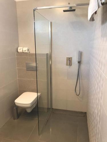 Ванная комната в Apartamenty Przy Latarni Kropla Bałtyku