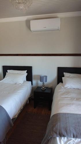 Katil atau katil-katil dalam bilik di StableWood Lodge