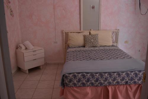 Una cama o camas en una habitación de Posada del Mar