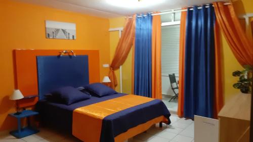Llit o llits en una habitació de Appartement D'ZIL
