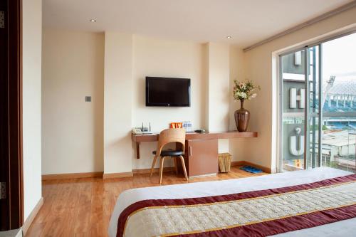 โทรทัศน์และ/หรือระบบความบันเทิงของ Thu Do Hotel